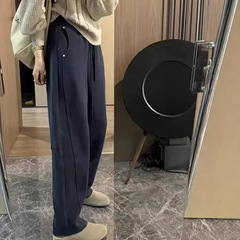 大きいサイズの曲がりくねった刀の衛のズボンの女性の2024秋はやせてゆったりしています。