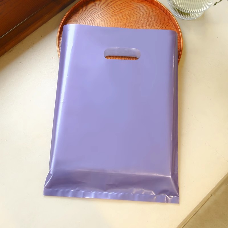 Bolsa de mano de tienda de ropa de grosor, bolsa de embalaje de ropa para niños y niñas, bolsa de almacenamiento de cosméticos, bolsa de regalo, bolsa de embalaje comercial