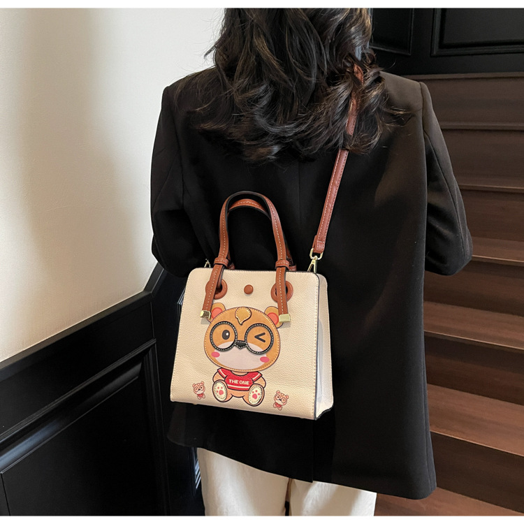 Bolso Tote transfronterizo para mujer de gran capacidad 2025 nuevo bolso bandolera de banda ancha salvaje de verano bolso de clase portátil de ocio