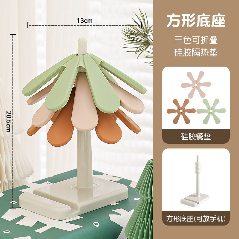 갈색과 녹색의 사각형 베이스 단열 패드 - 휴대폰을 담을 수 있음