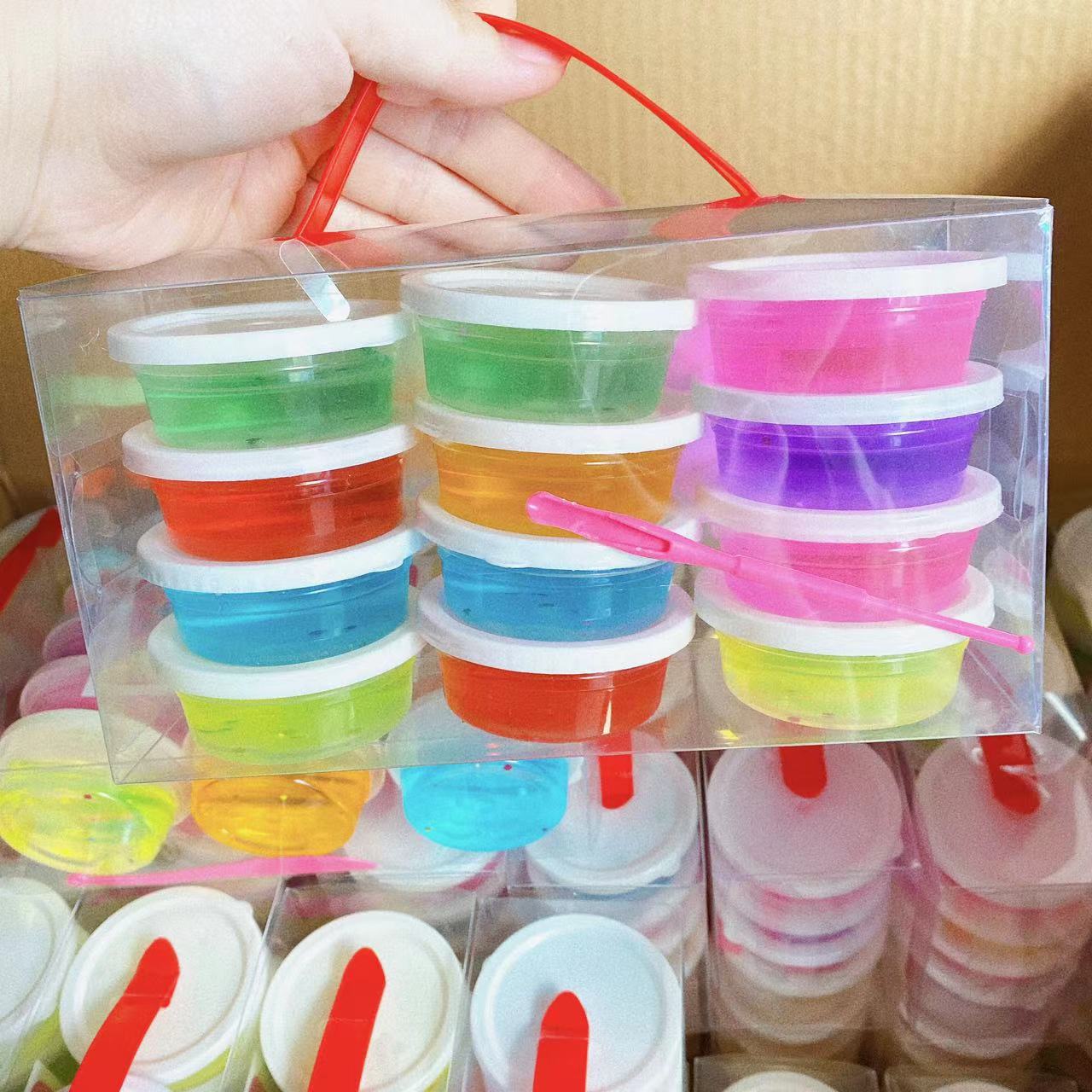 12 En Caja portátil traje cristal barro colorido color sólido cristal barro traje translúcido espuma pegamento en stock al por mayor