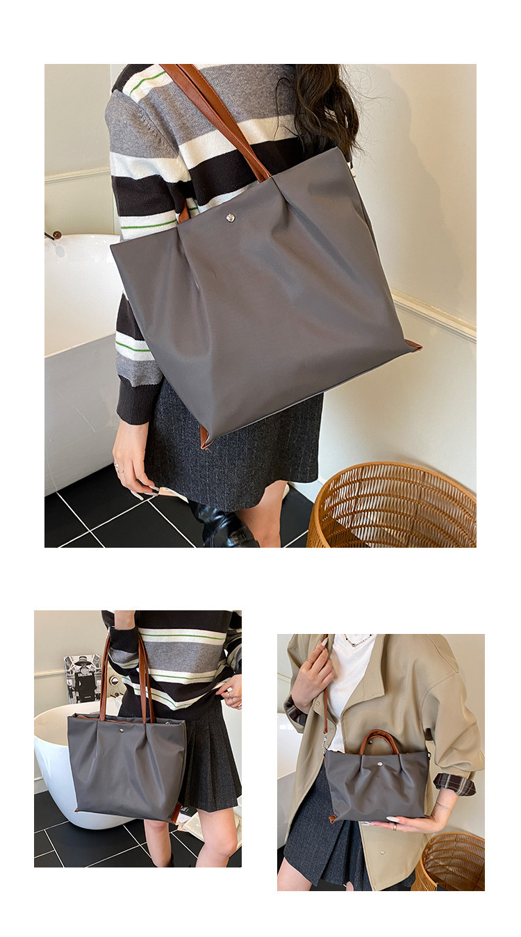 Borsa a tracolla casual da donna in tessuto Oxford, capiente, elegante e versatile, ideale per gli spostamenti quotidiani._voghion.com