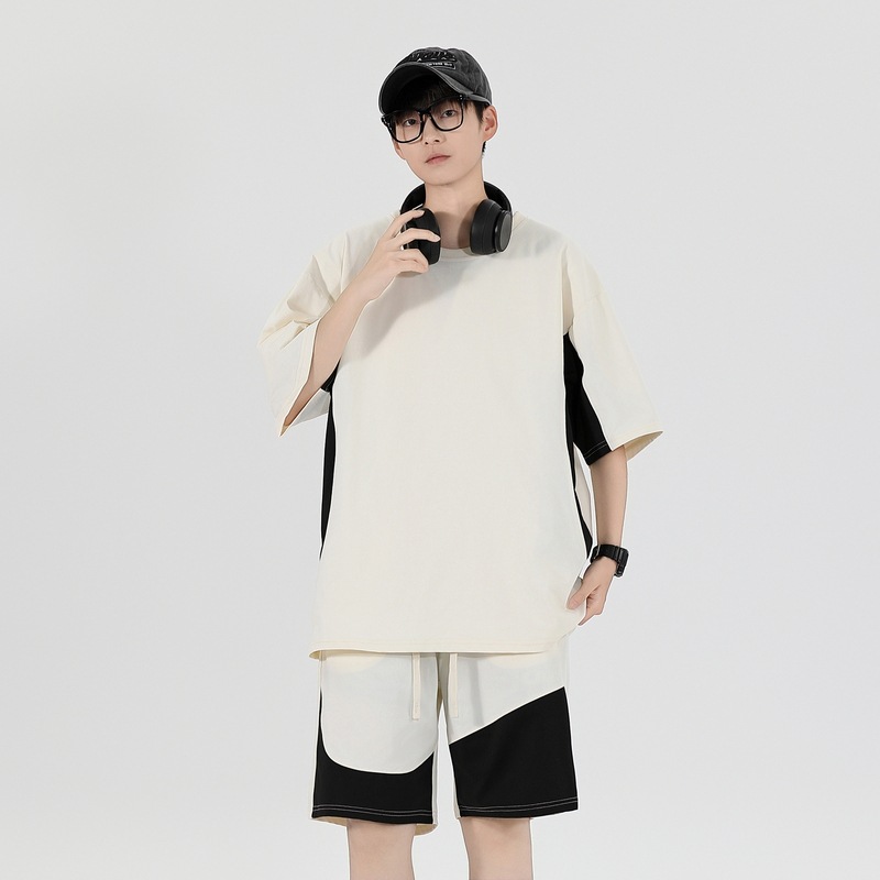 Tren de moda de verano Traje de ocio deportivo juvenil para hombres Pantalones cortos sueltos de manga corta de gran tamaño Hermoso traje de dos piezas para hombres