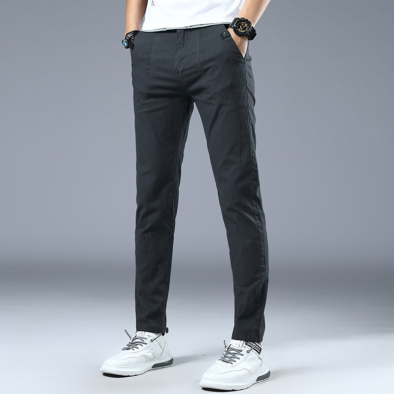 Four Seasons pantalones casuales elásticos para hombres al por mayor de los hombres jóvenes estilo coreano SLIM-Fit adelgazamiento simple moda lápiz pantalones hombres