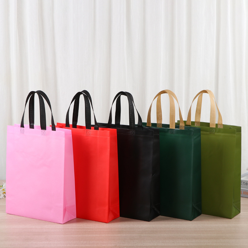 Bolsas de mano no tejidas coloridas bolsas de regalo en blanco engrosado para llevar bolsas de compras