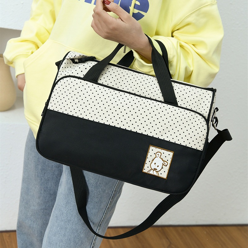 Bolsa de viaje para padres e hijos, bolso casual de moda, bolso de hombro impermeable multifuncional de gran capacidad.