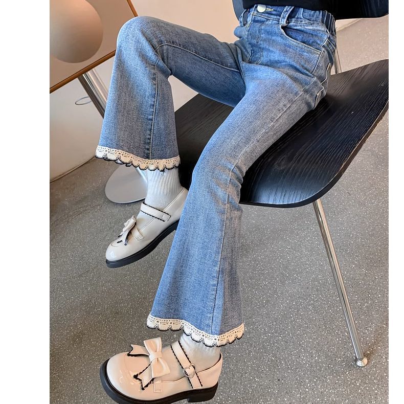 Tendencia de nuevos pantalones infantiles primavera y otoño estilo extranjero pantalones casuales de otoño sueltos pantalones vaqueros de otoño de niña