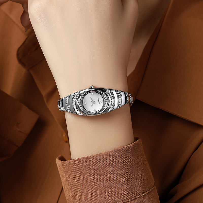 外国貿易の爆発的なクロスボーダーのファッションの女性の腕時計の手のチェーンの時計の石英の時計のメーカーの現物の卸売りは代行を代行します。