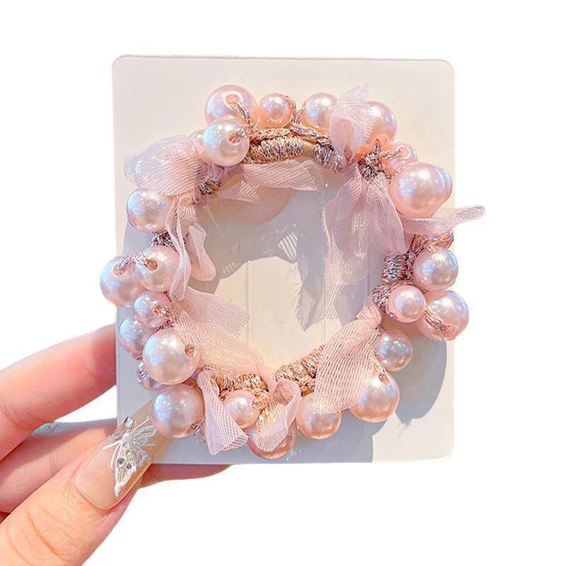 Moda nueva alta sensación de cabello de perla nueva línea de cabello de alta gama de cabello de cabello de mujer bola de cabello anillo de cabello flores