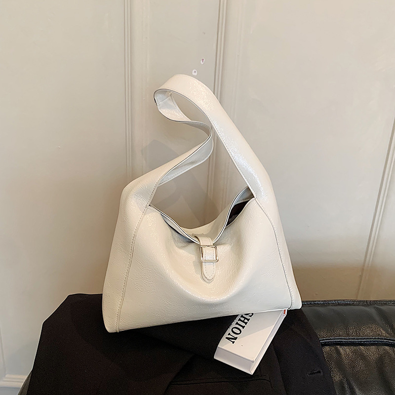 Nicho de diseño sensación de cuero suave bolso debajo de la axila mujer 2026 textura de moda gran capacidad bolso de hombro bolso de mano