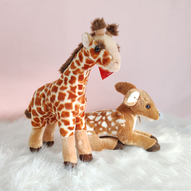 Aurora jirafa peluche cervatillo muñeca con soporte muñeca muñeca regalo de cumpleaños decoración transfronteriza