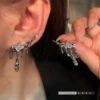 Серьги‑гвоздики капля с цирконием (лавовый эффект)
