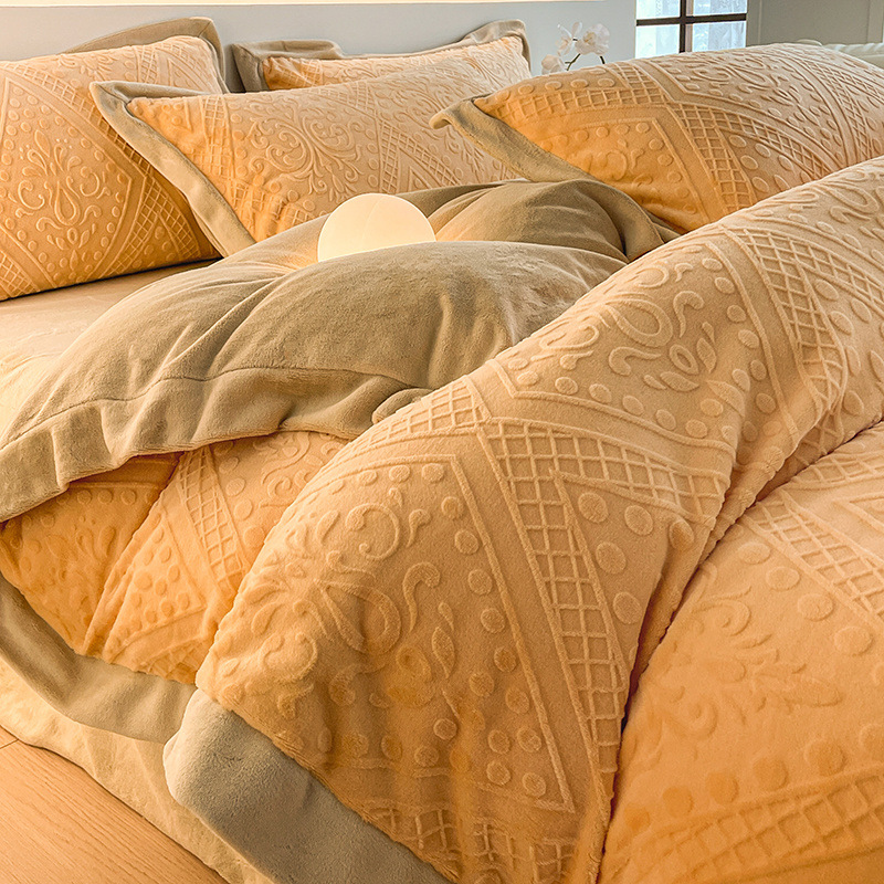 Cama de terciopelo de leche tallada de alta gama de lujo ligero de cuatro piezas de terciopelo de coral de invierno de doble cara más funda de edredón de sábana de terciopelo de tres piezas
