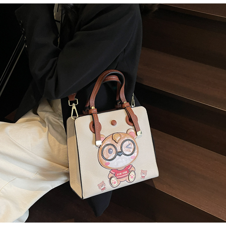 Bolso Tote transfronterizo para mujer de gran capacidad 2025 nuevo bolso bandolera de banda ancha salvaje de verano bolso de clase portátil de ocio