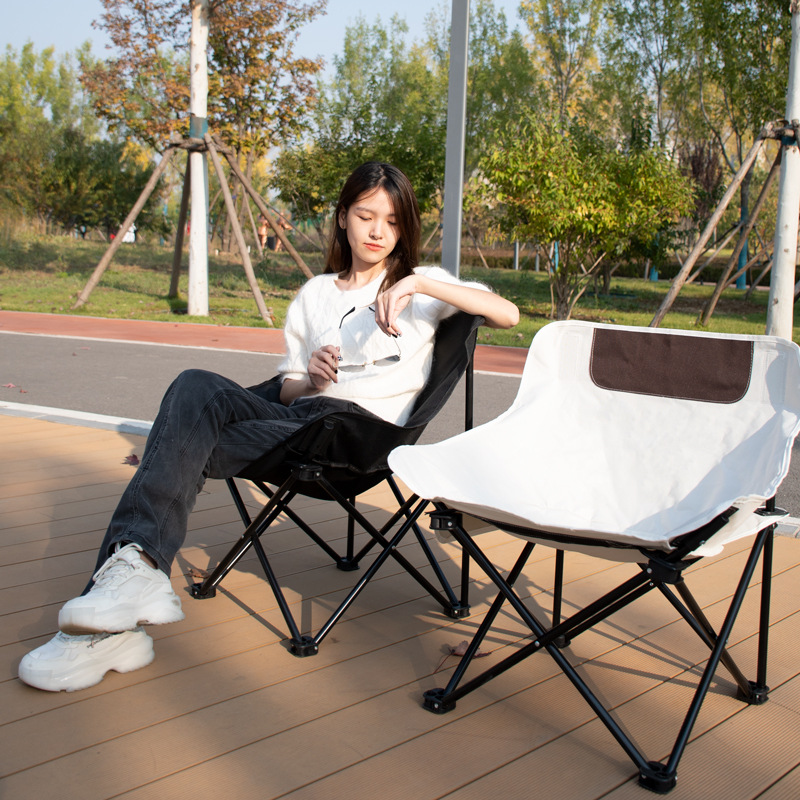 Chaise pliante extérieure en gros d'usine Chaise de pêche Chaise pliante lune Tour pique-nique auto-conduite Chaise pliante peut traiter LOGO