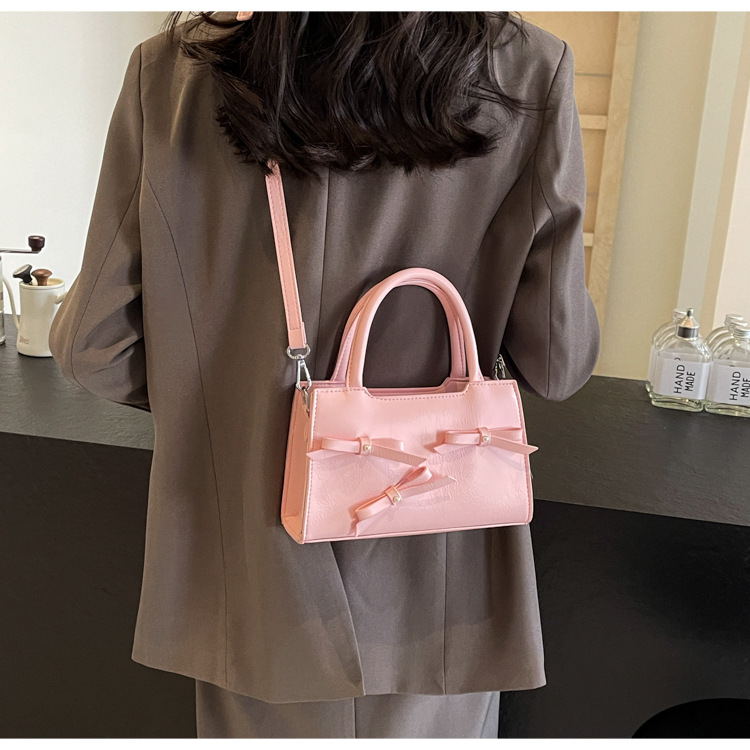 Women's Medium Pu Leather Bow Knot Elegant Zipper Handbag display picture 13