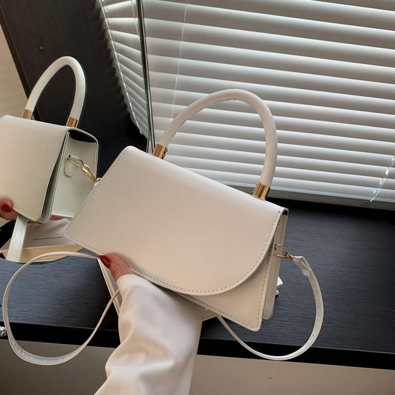 ESTILO OCCIDENTAL con textura pequeña bolsa para las mujeres 2024 Nuevo este año popular de color sólido bolsa de mensajero de moda portátil pequeña bolsa cuadrada de moda