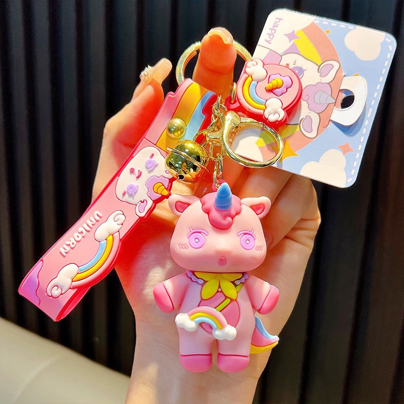 Keychain dinosaurio auténtico lindo bolso colgante de goma blanda llavero de automóvil muñeca pequeña máquina de regalos al por mayor image 25