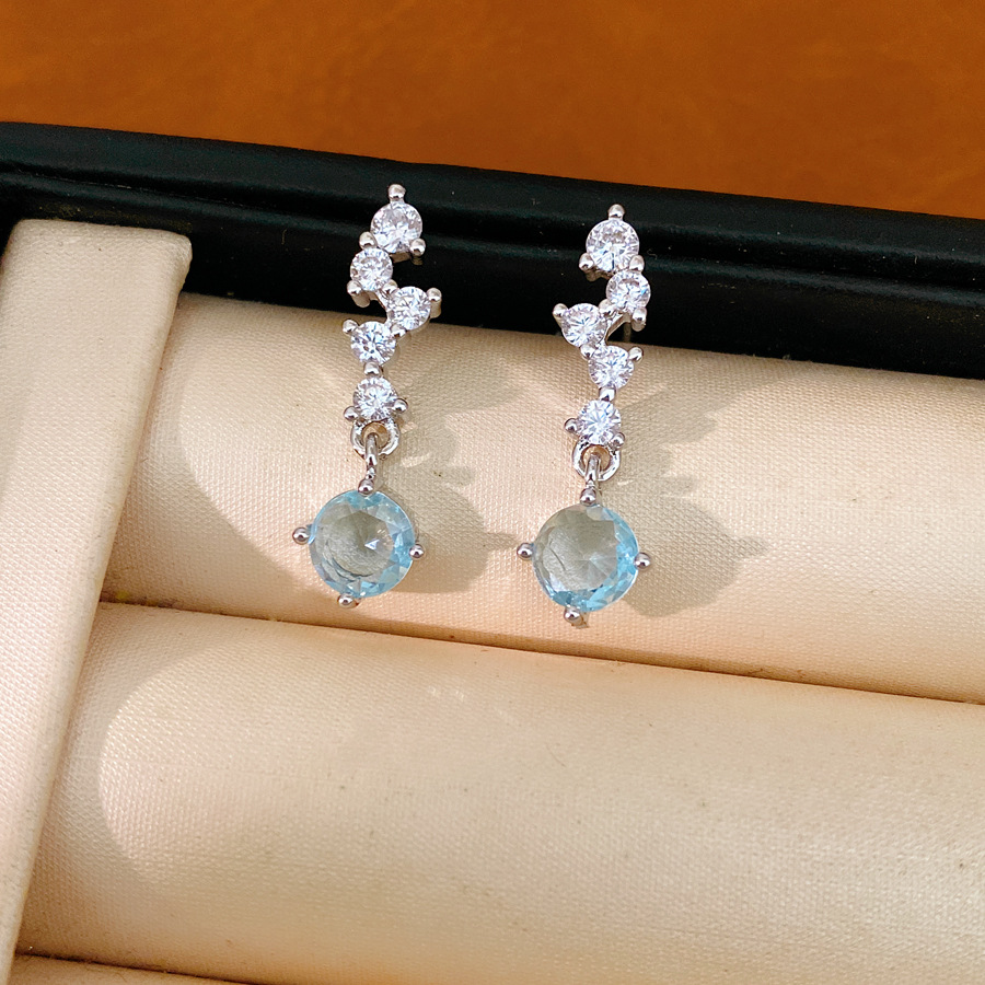 Agujas de plata de piedra de silicio pernos redondos simples diarios temperamento versátil pendientes de moda ligero lujo alta sensación de auriculares al por mayor image 8