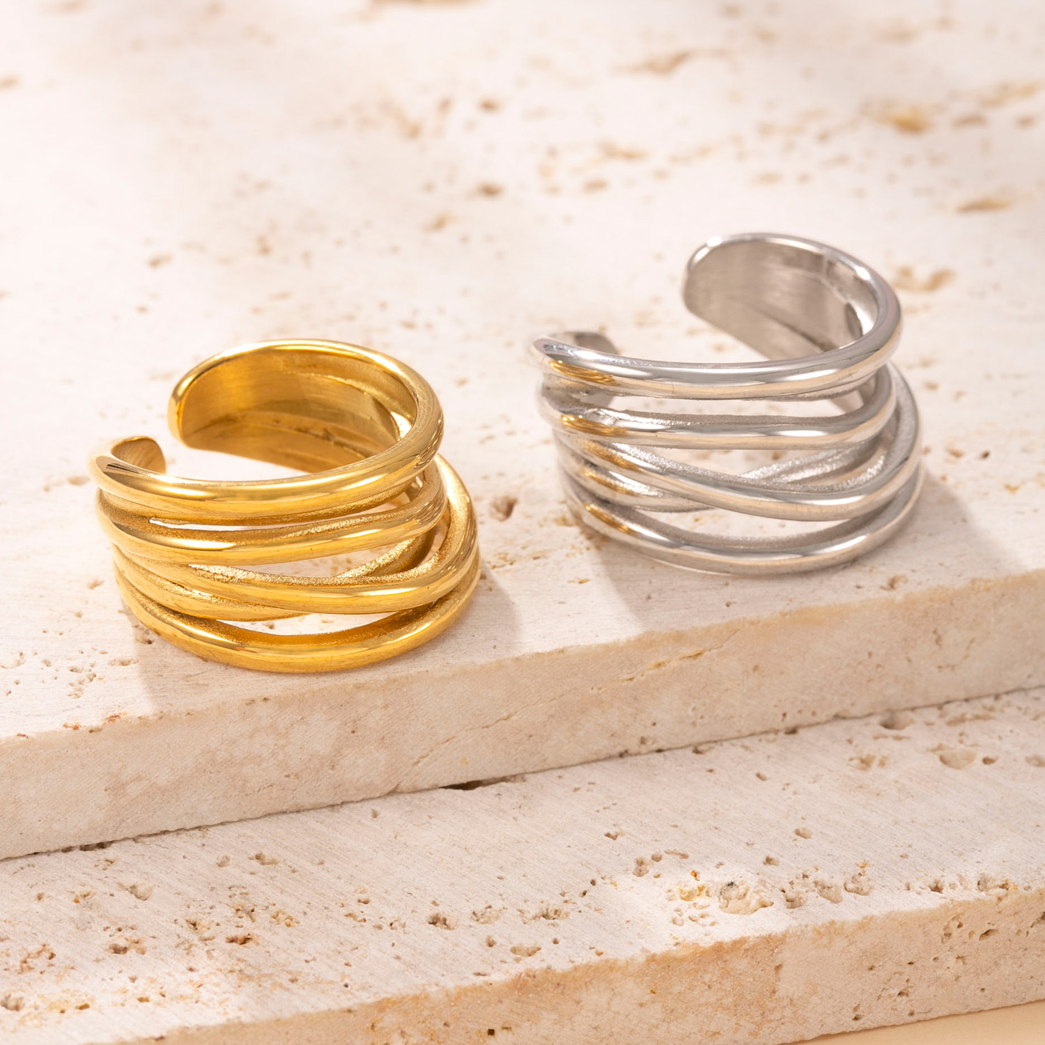 Anillo de acero inoxidable de moda europea y americana fundido anillo de apertura de línea irregular 18k chapado en oro viento frío joyería de acero de titanio