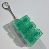 Double row six buttons-transparent shell-green transparent cap