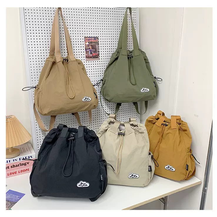 轻便旅行背包休闲大容量女包2025新款手提包时尚原宿风尼龙双肩包