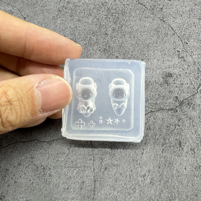 氷感の高い爪の金型のチューリップの漫画の蝶結びのシリコンの膜は爪のツールセットの工場の卸売りを備えます。|undefined