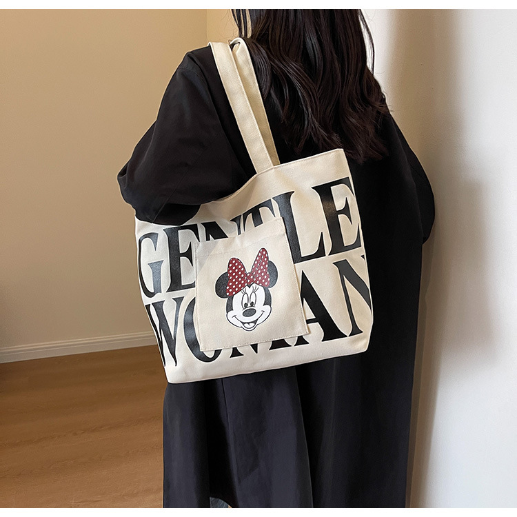 2024 New canvas bag for women, single-shoulder, student, book, large-capacity hand-held bag with zipper, versatile for office workers' commuting undefined