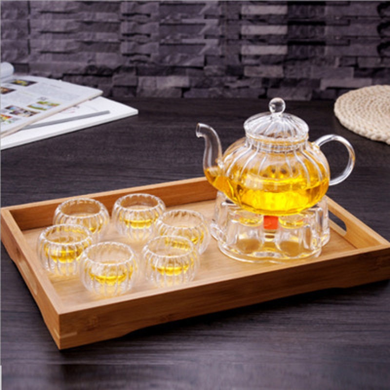 Venta al por mayor de borosilicato resistente al calor juego de té de vidrio engrosado Filtro de flores y hierba tetera a rayas calabaza olla traje de entrega de una sola pieza