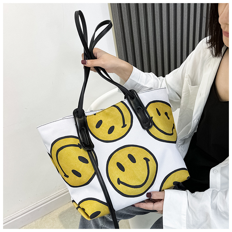 Korean Dongdaemun New Cute Fashion Smiley Canvas Women's Bag Printed Canvas Portable Shoulder Bag Large Tote Bag display picture 7