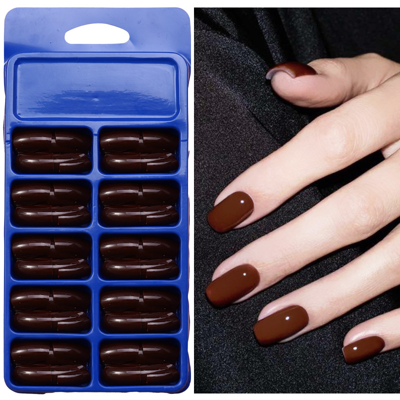 120 piezas de uñas falsas de color sólido desnudas cuadradas cortas desmontables de uñas en una caja azul