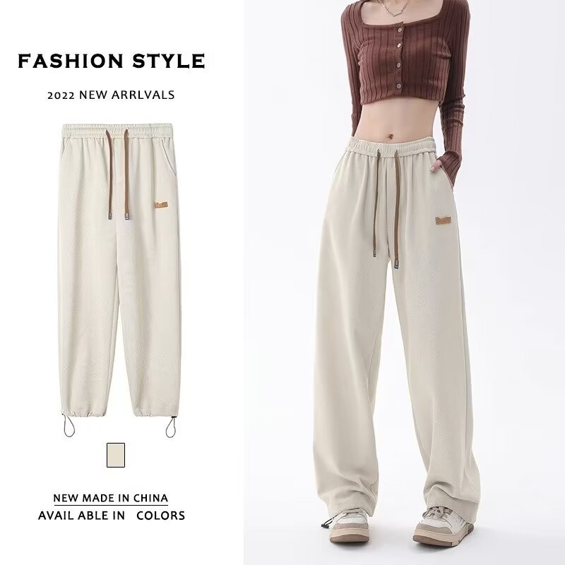 Pantalones casuales de primavera y otoño para niños pareja pantalones largos rectos sueltos 2026 estilo de Hong Kong nuevo