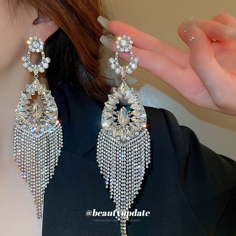 Aguja de plata diamante flor hueco pendientes de gota de agua personalidad exagerada larga borla pendientes moda europea y americana pendientes de la industria pesada