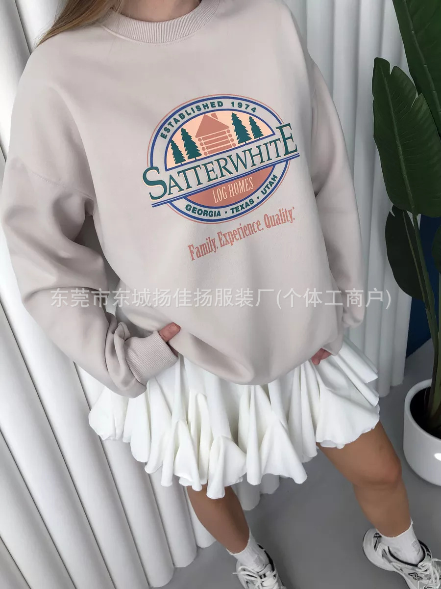 Elegant trend demi-season warm sweatshirt with a round collar