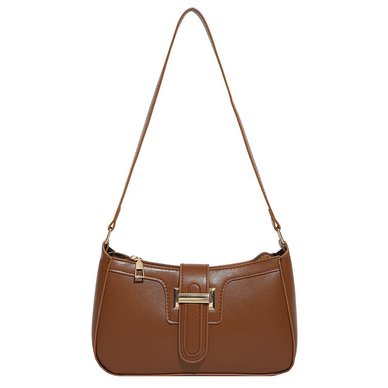 2025 nueva moda versátil bolso de brazo de mujer sensación de alto nivel bolso de hombro simple nicho de diseño de mano de viaje