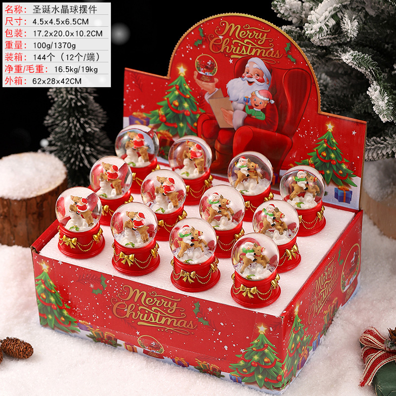 Una variedad de regalos de decoración de Navidad Navidad iluminante bola de cristal caja de música ventana diseño de velas lámparas de viento árbol de Navidad