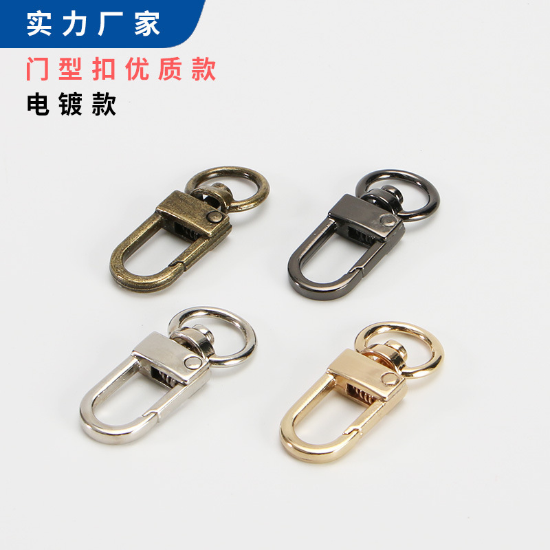 メーカーの卸売りのカバンの金属の部品の合金のリボンのキーホルダーのボタンのフックは亜鉛合金の犬のボタンのアクセサリーのペンダントを掛けます。|undefined