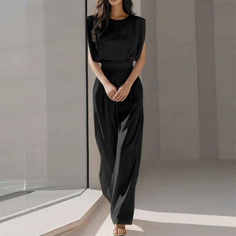 Mono casual de pierna ancha con cuello en V y manga larga de murciélago, color liso, estilo nuevo de primavera para mujer europea y americana, ideal para comercio transfronterizo 2026.