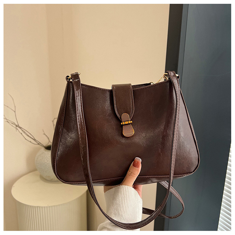 Nichezhong retro simple bolso de brazo bolso de mujer 2025 primavera nueva moda bolso pequeño de viaje de moda mochila de hombro