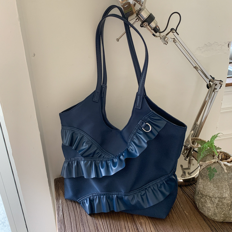 Versión coreana del bolso de nicho 2025 verano nuevo bolso femenino lindo bolso de encaje casual bolso de hombro de gran capacidad