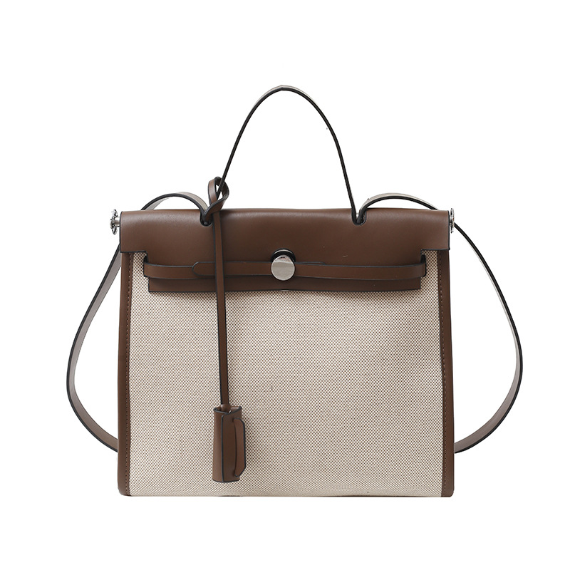 Bolso Carey Tote portátil de alta gama 2025 Nuevo estilo transfronterizo Bolso bandolera de gran capacidad de contraste de lona