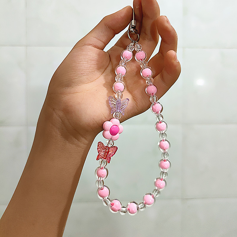 Flor Mariposa Caja del teléfono móvil Cadena con cuentas Douyin Bolso en vivo Auriculares Llavero Macaron Colgante Accesorios Cuerda