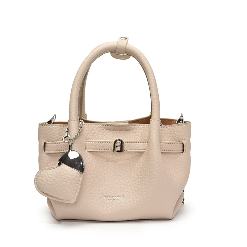 Tendencia versátil bolso de mano para mujeres 2025 nuevo estilo simple textura de transporte de tren mochila de alta calidad bolso de brazo de moda