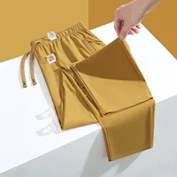 Летние солнцезащитные брюки из ледяного шелка для женщин, новый стиль, с карманами, спортивные повседневные свободные дышащие прямые брюки для мужчин, быстросохнущие.