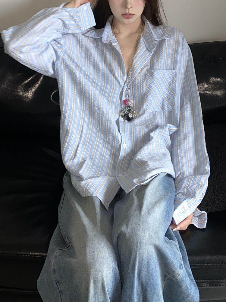 アメリカのレトロな秋の新型の怠惰な風の爽やかなストライプのシャツのコートの女性のゆったりしている百合の日焼け止めの長袖のシャツ