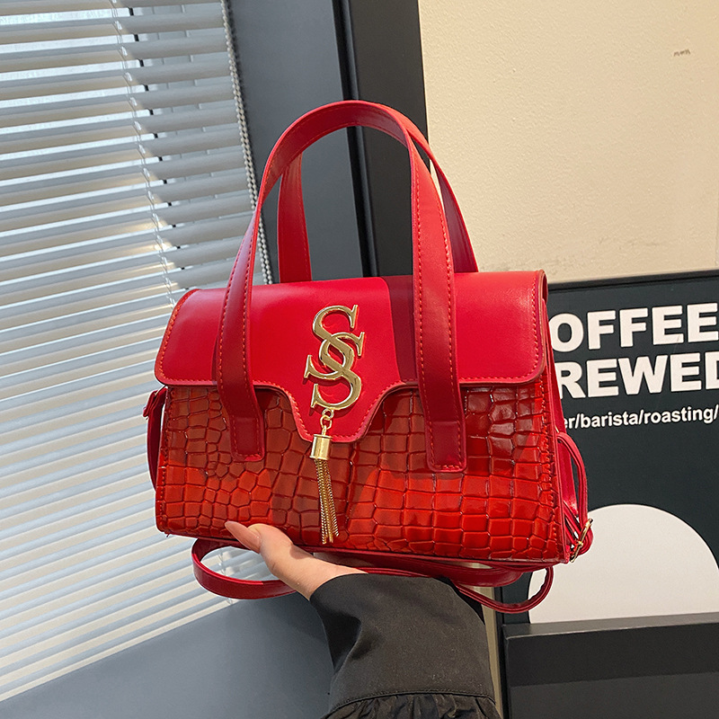 Bolso de borla con letras con patrón de cocodrilo de nicho 2024 nueva costura de moda estilo occidental simple y elegante bolso de hombro femenino