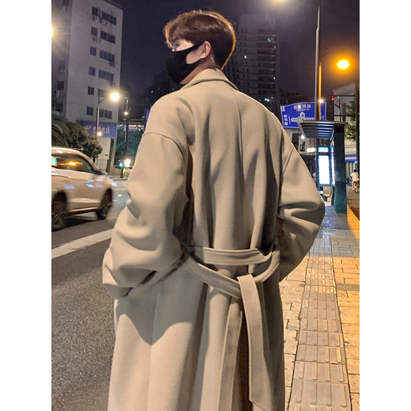 韓国版百合の中長のウインドブレーカーの男性の秋冬のタイプは膝の英倫の風毛のコートを過ぎてゆったりとしています。