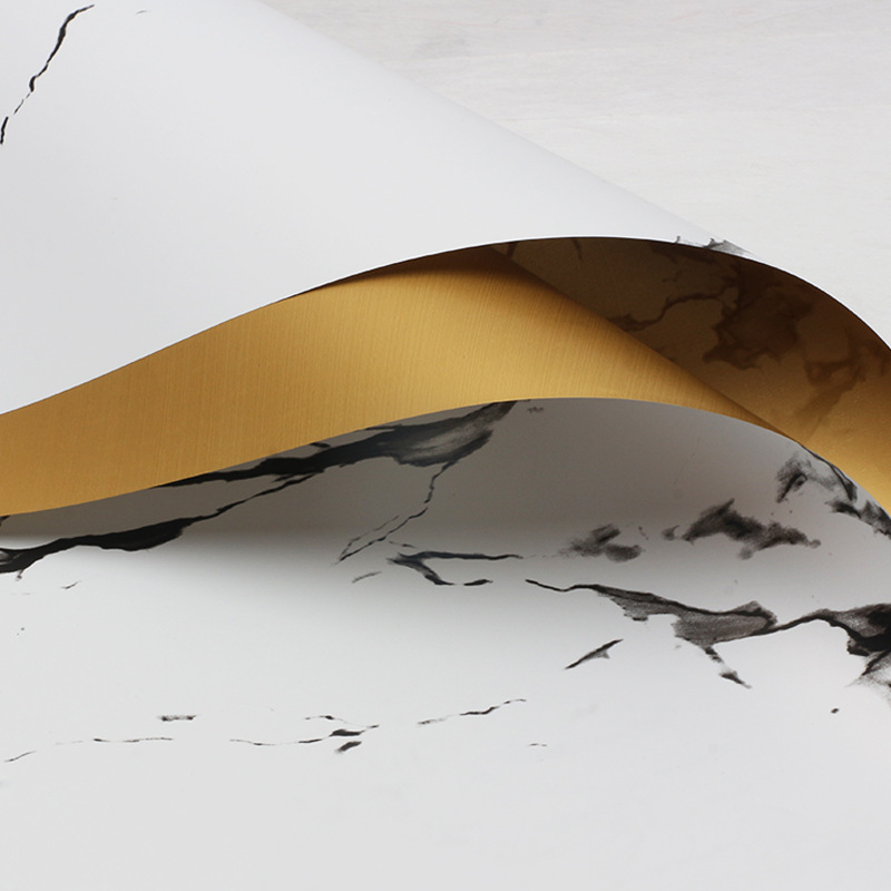 Huaxi comercio exterior transfronterizo mayorista oro lujo papel impermeable mármol oro papel de flor florista papel de embalaje