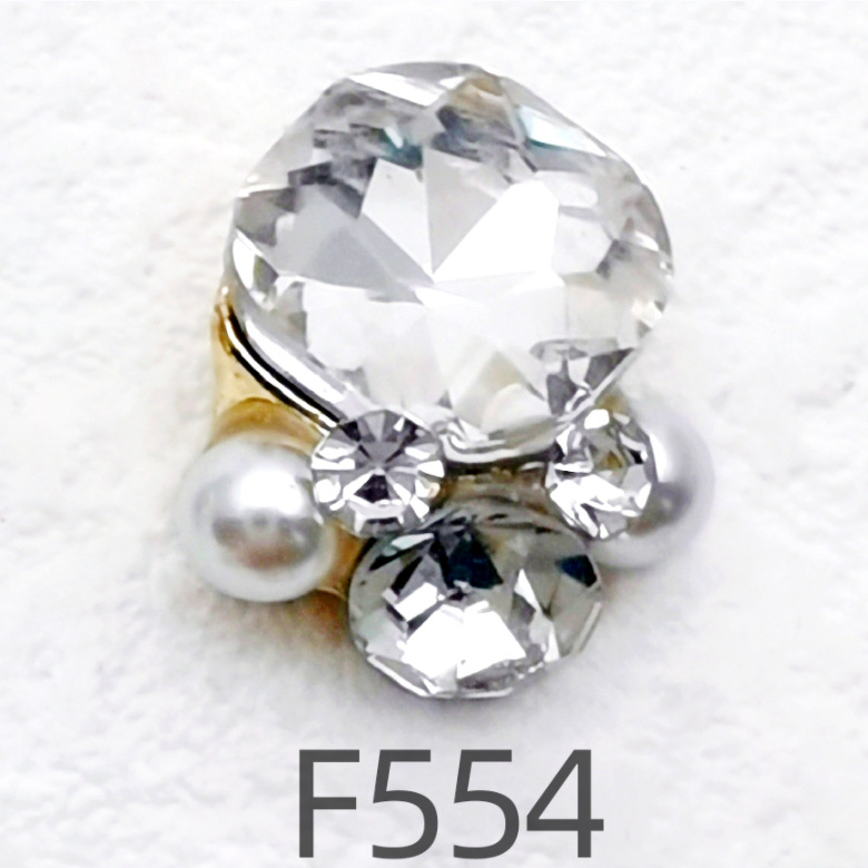 F554