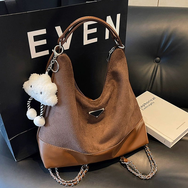 Capacious one-shoulder bag, trend shoulder bag, worn on the shoulder